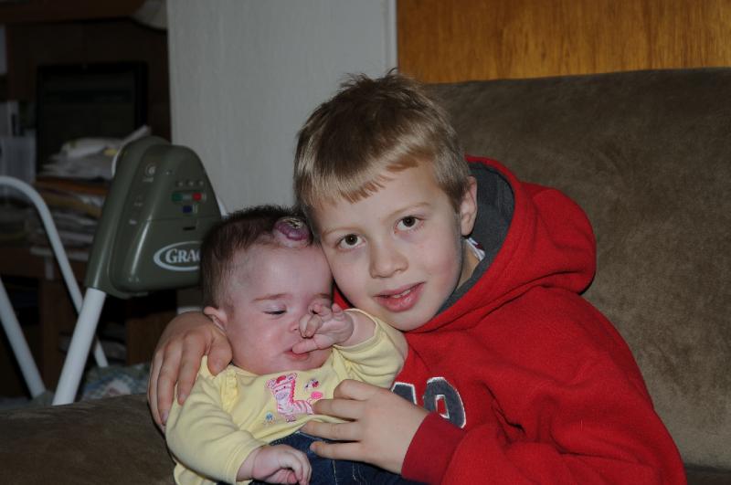 erik_morgan.jpg - Erik and Morgan...he really likes those little girls
