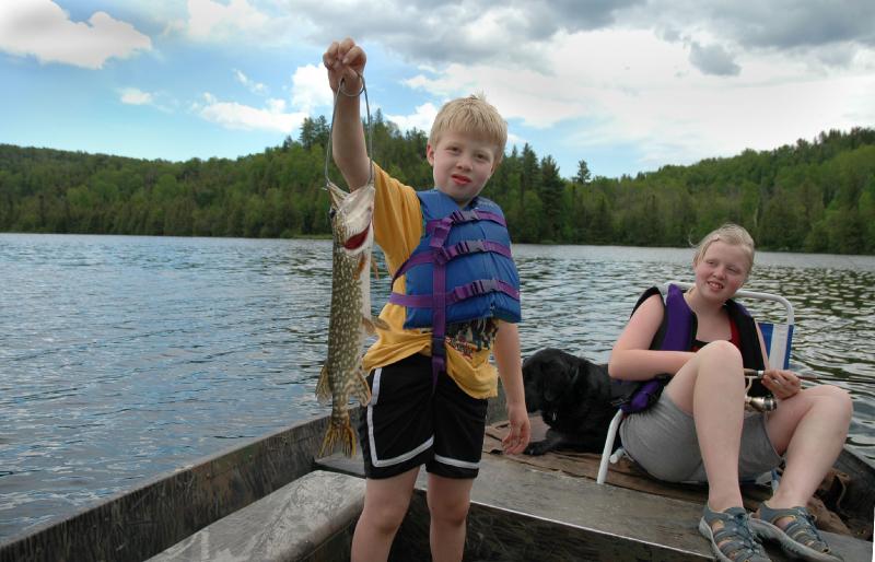 pike.jpg - Fishing on McFarlane in June with the kids. Erik shows off his Northern Pike
