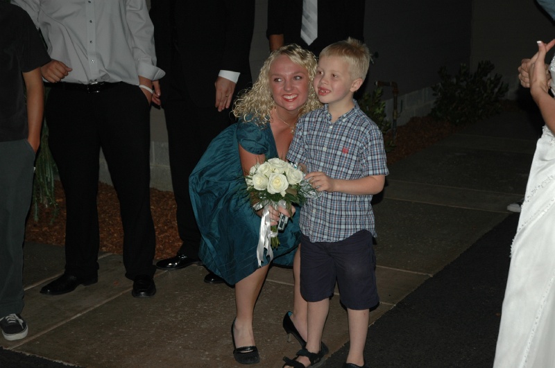 DSC_7785.JPG - Erik (who caught the garter) and the cute girl that caught the bouquet!